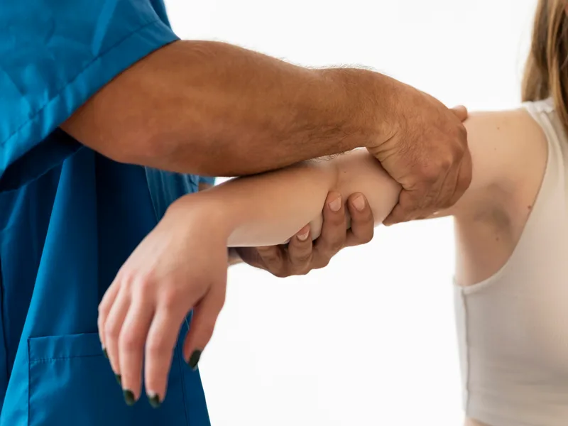 Chiropractic care for elbow pain at Health & Healing Family Chiropractic in Andover