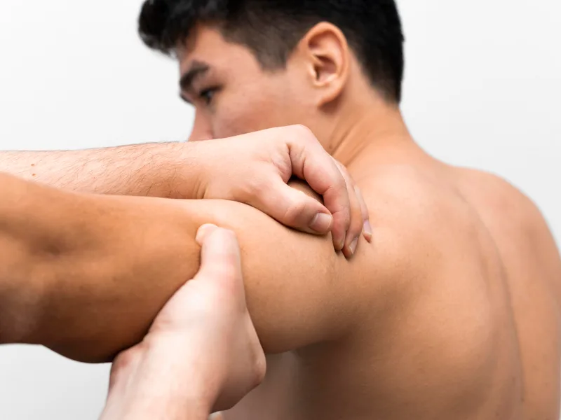 Health & Healing Family Chiropractic treating shoulder pain in Andover